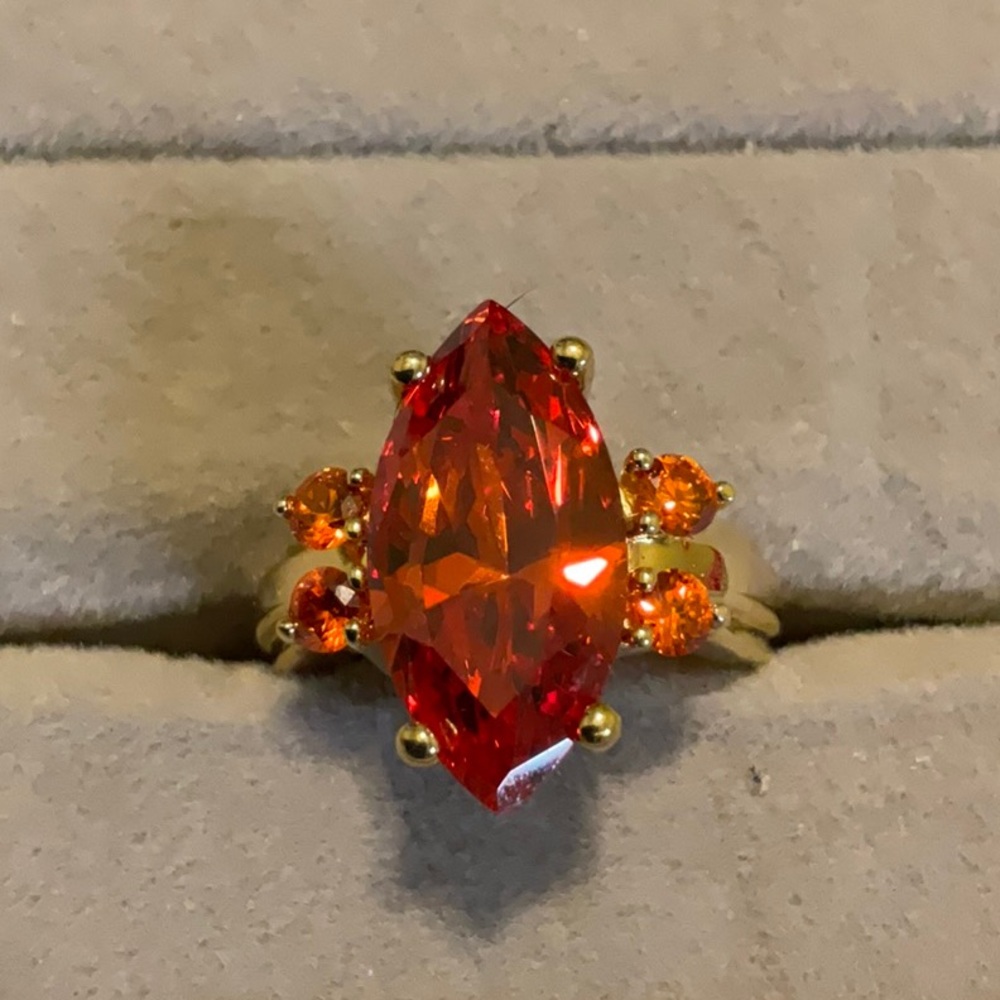 Elegant Gold Toned Sterling Silver and Red Gemstone Ring
